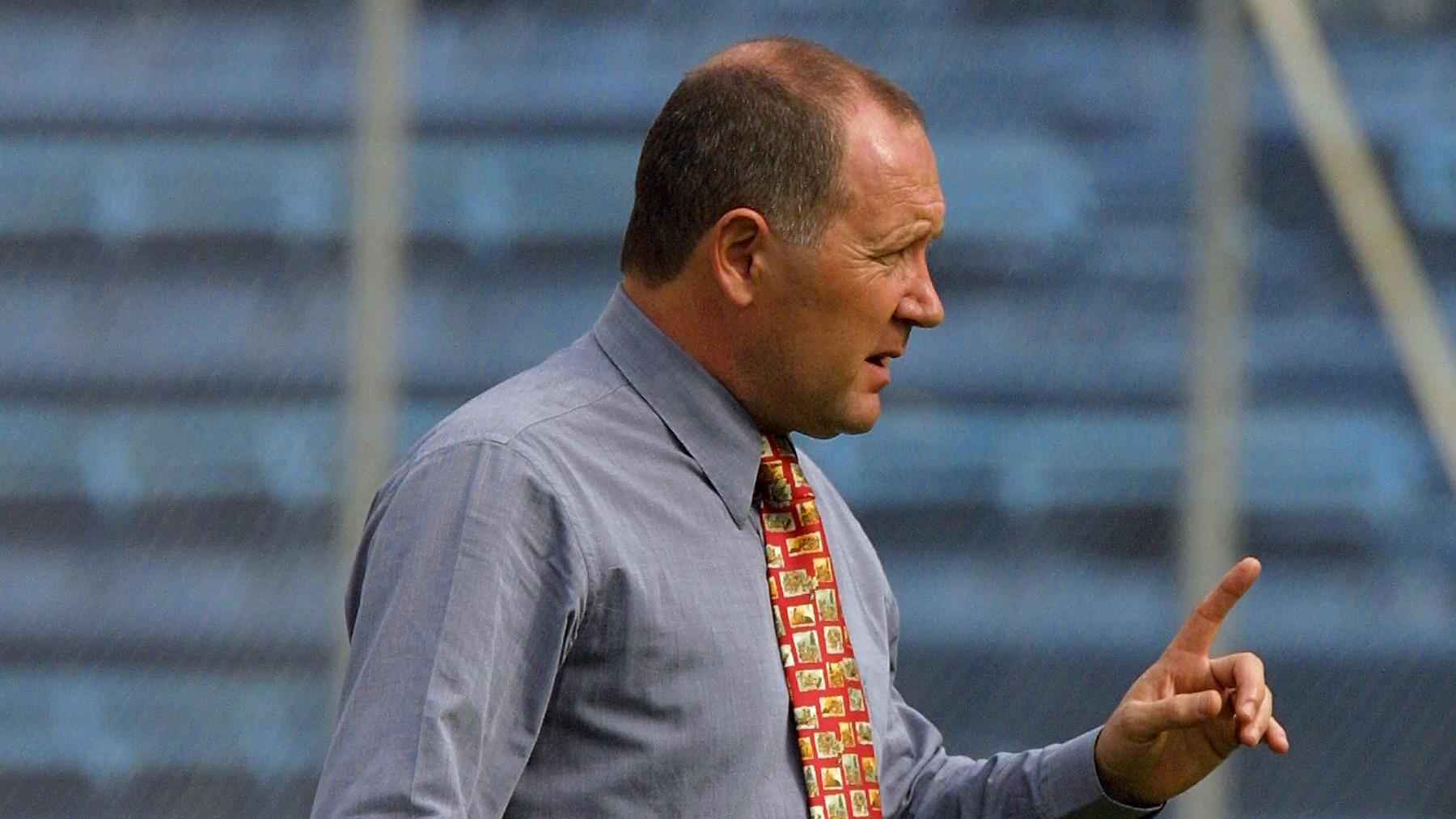 Carlos Babington con León en 2001.